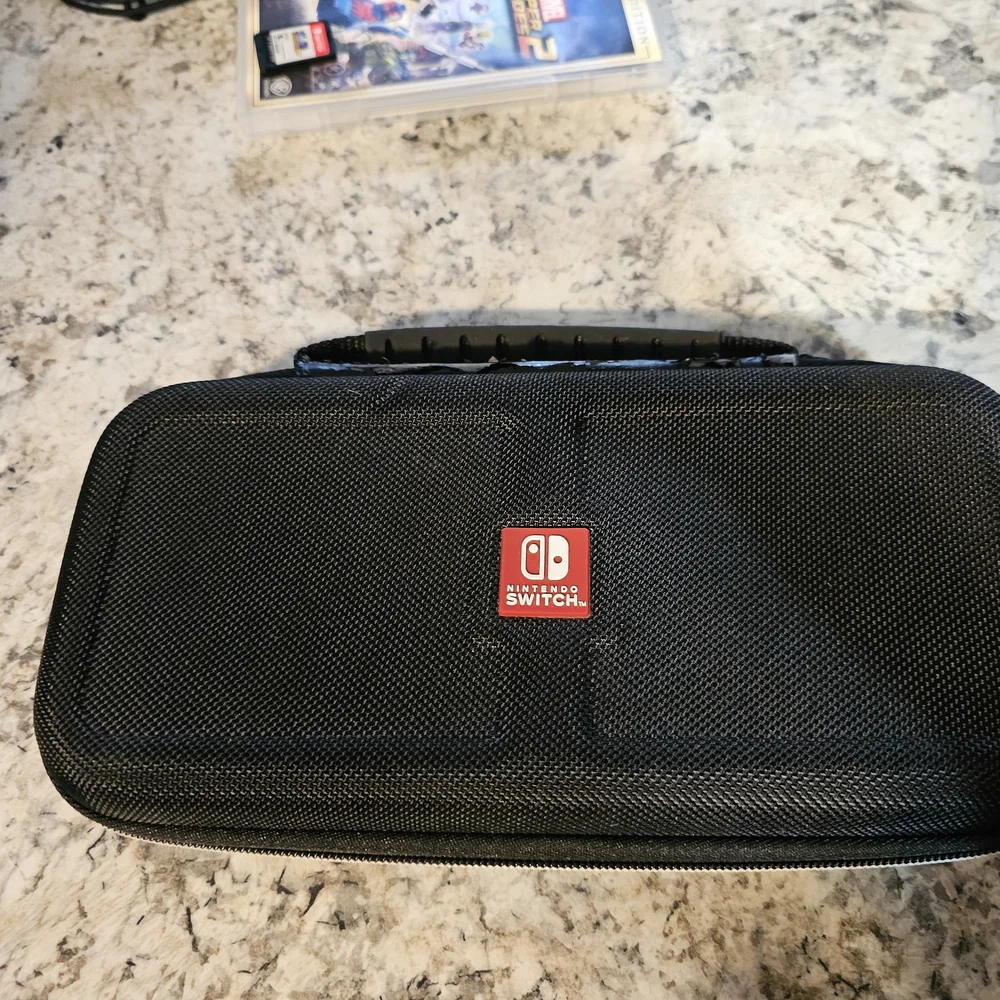 Nintendo Switch with Gray Joy-Con Controllers, Joy Con Grip, And 2 Games. No Doc